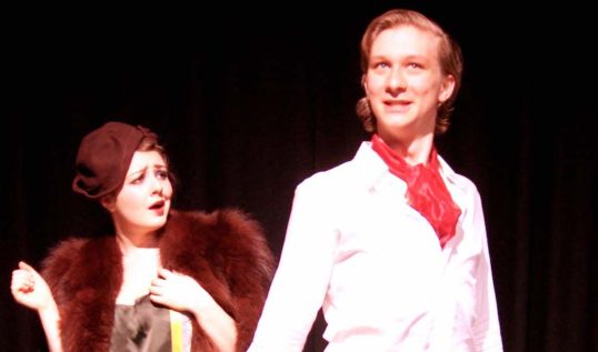 Jess Barker (The drowsy chaperone) and Eric Geistfeld (Aldolpho) in the Edinburgh University Savoy Opera Group's production of the Drowsy Chaperone. Edinburgh Fringe 2012