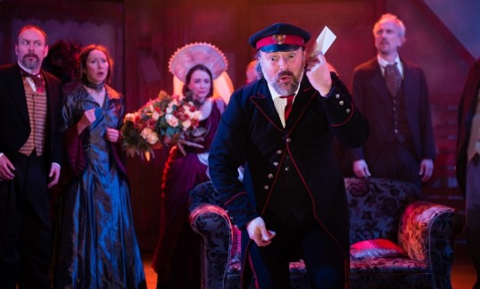 The sleekit steaming open of a letter in Communicado's hilarious and vicious Government Inspector. Production photo © Communicado