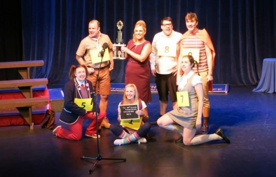 Rona Peretti (Lesley Ward holding trophy) with the spelling bee participants. Photo © Carole Gibson