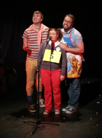 Logainne SchwartzandGrubenierre (Judith Barron) with her two dads. Photo © Carole Gibson