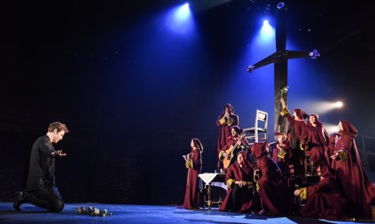 Jamie Sives (James III) and his decidedly Pythonesque choir. Photo: Robert Day