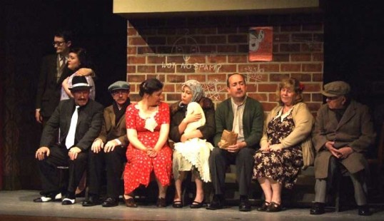 The ensemble take shelter. Photo: Marion Donohoe