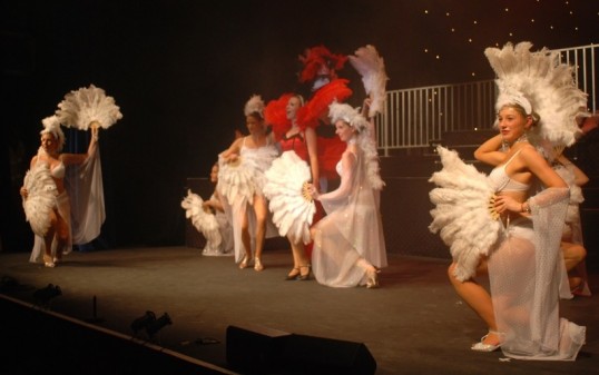 Who’s this? Louise Hunter in red with the dancers in Showcase 2013: Musical Diversity. Photo: Mark Cassidy