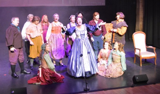 Liz Landsman with the ensemble. Photo: Iain Mackintosh
