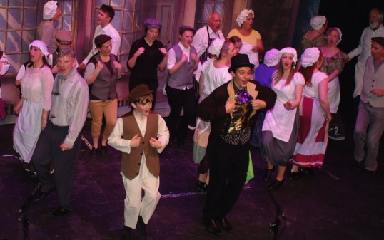 Oliver, Dodger and ensemble in Consider Yourself. Photo: Peter Antonelli