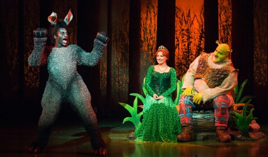 Idriss Kargbo (Donkey), Bronte Barbe (Princess Fiona) and Dean Chisnall (Shrek). Photo: Helen Maybanks