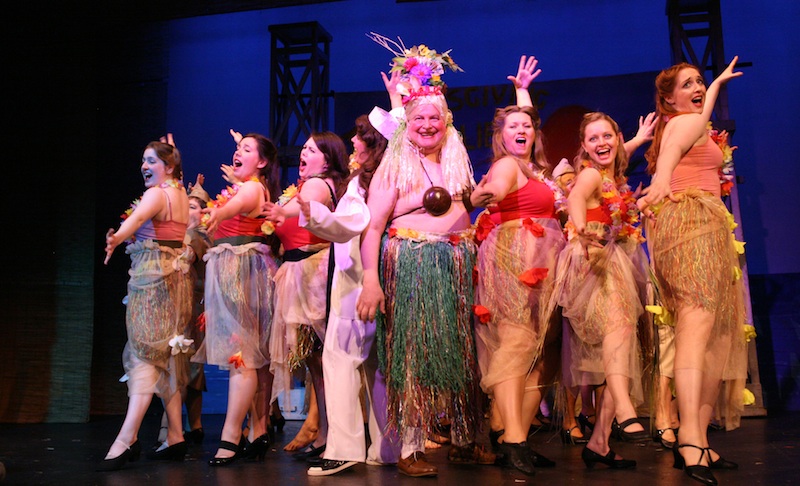 Simon Boothroyd as Luther Billis, Fiona Main as Nellie Forbush & members of the chorus Photo Darren Coutts