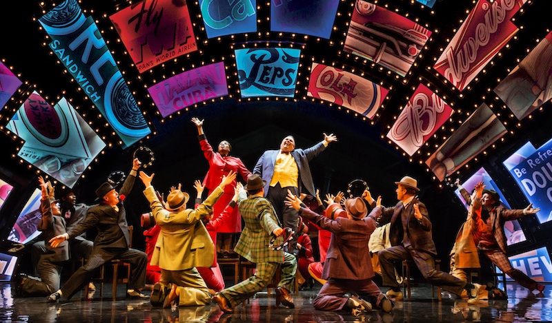 Jack Edwards (Nicely Nicely) and Melanie Marshall (General Cartwright) and the company in Sit Down You're Rockin' the Boat. Photo: Johan Persson