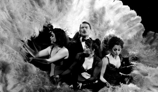 John Partridge and Ensemble. Photo: Catherine Ashmore