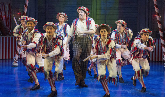 Jason Manford and dance troupe in Me Ol' Bamboo. Photo: Music & Lyrics
