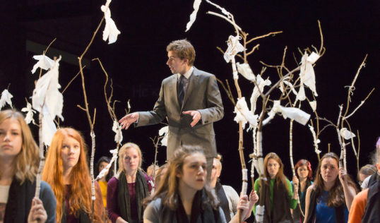 Oscar Batterham and chorus. Photo Stephen Cummiskey