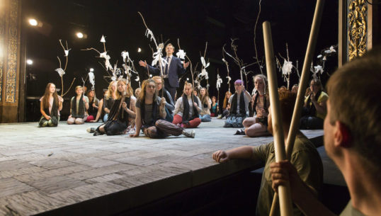 Oscar Batterham and the choruses. Photo Stephen Cummiskey