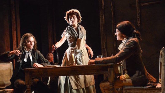 Joseph Timms (Carton), Rebecca Birch (Waitress) and Jacob Ifan (Darnay) Photo: Robert Day