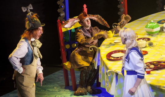 00 2. Tam Dean Burn as the Mad Hatter, David Carlyle as the March Hare, and Jess Peet as Alice. Photo credit Drew Farrell copy