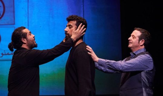 Alaa Shehada, Faisal Abualheja and Mark Thomas on stage in Show Time from the Front Line. Pic Steve Ullathorne