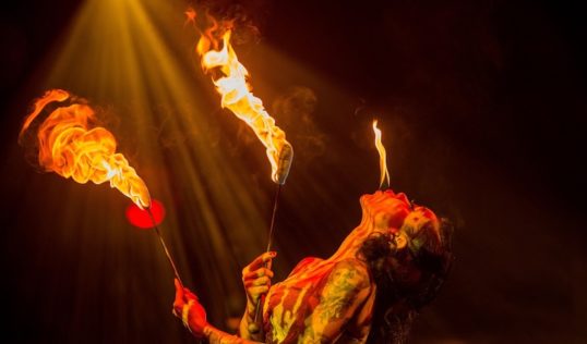 Heather Holliday breaths fire in La Clique Noel. Pic: Ian Georgeson