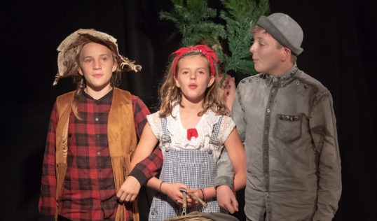 Lily Meyers as Scarecrow, Robin Hill as Dorothy and Hugh Harris as Tin Man in Tribe Porty Youth Theatre's EdFringe 2018 production of The Wizard of Oz.
