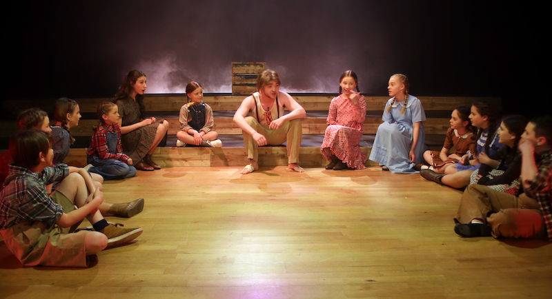 Will Rowse and the children’s chorus. Pic Mark Gorman