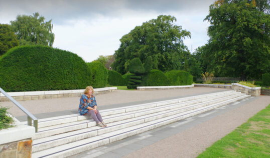 Helen Schofield on the steps of the Italian Garden at Saughton Park.